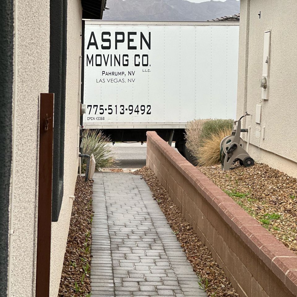 The Aspen Moving Company crew loading a moving truck